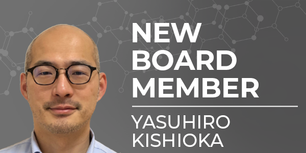 Gray background and professional headshot of male with text 'New Board Member Yasuhiro Kishioka'