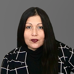 Image of female with black hair in front of gray background with text 'Member Spotlight Ananya Dubey'