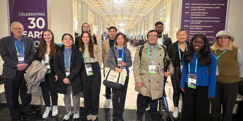 Biopharma students and mentors at a conference